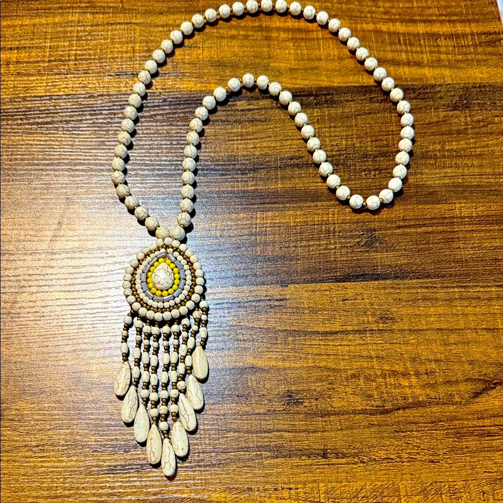 Elegant Beaded Necklace with Fringe
